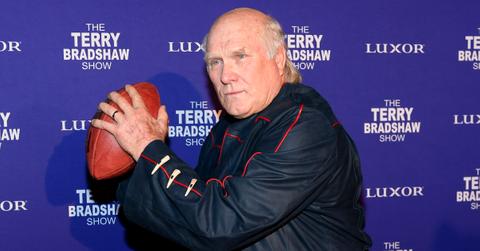 Terry Bradshaw holding a football