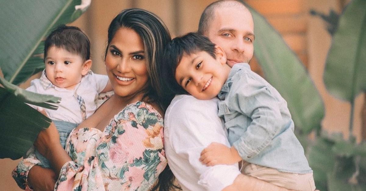 (L-R) Pooja Mehta and her husband, Shimon Himovich,as they hold their two sons