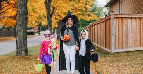 Mom with kids on halloween
