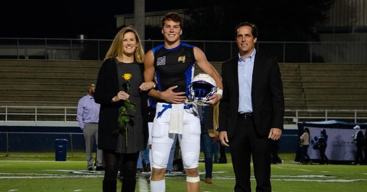 Riley Leonard and his parents, Heather and Chad