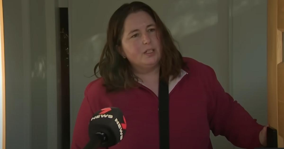 Erin Patterson slams the door in the face of a reporter