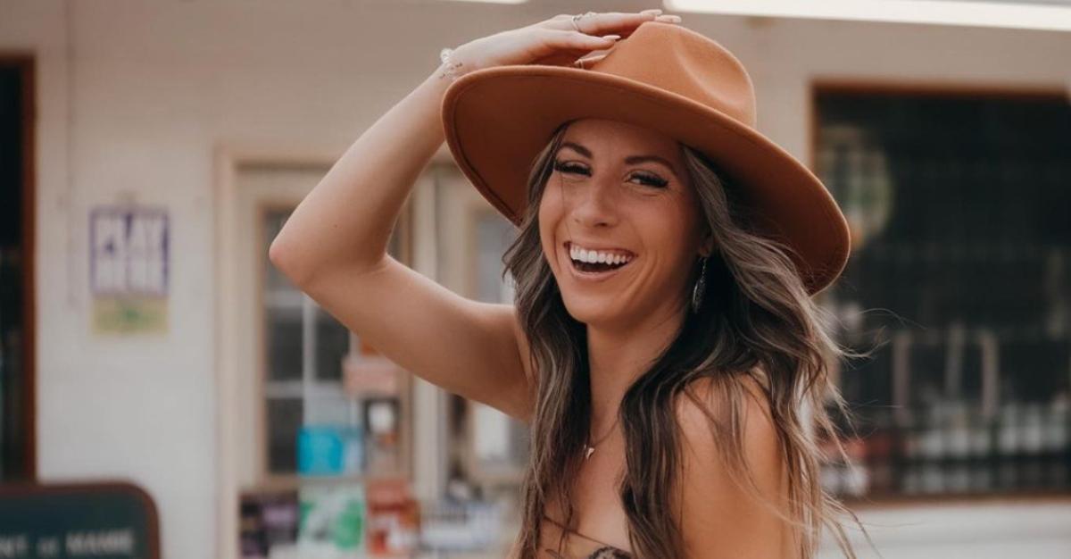 Zoe Weaver From 'Farmer Wants a Wife' poses in a cowboy hat for an Instagram photo. 