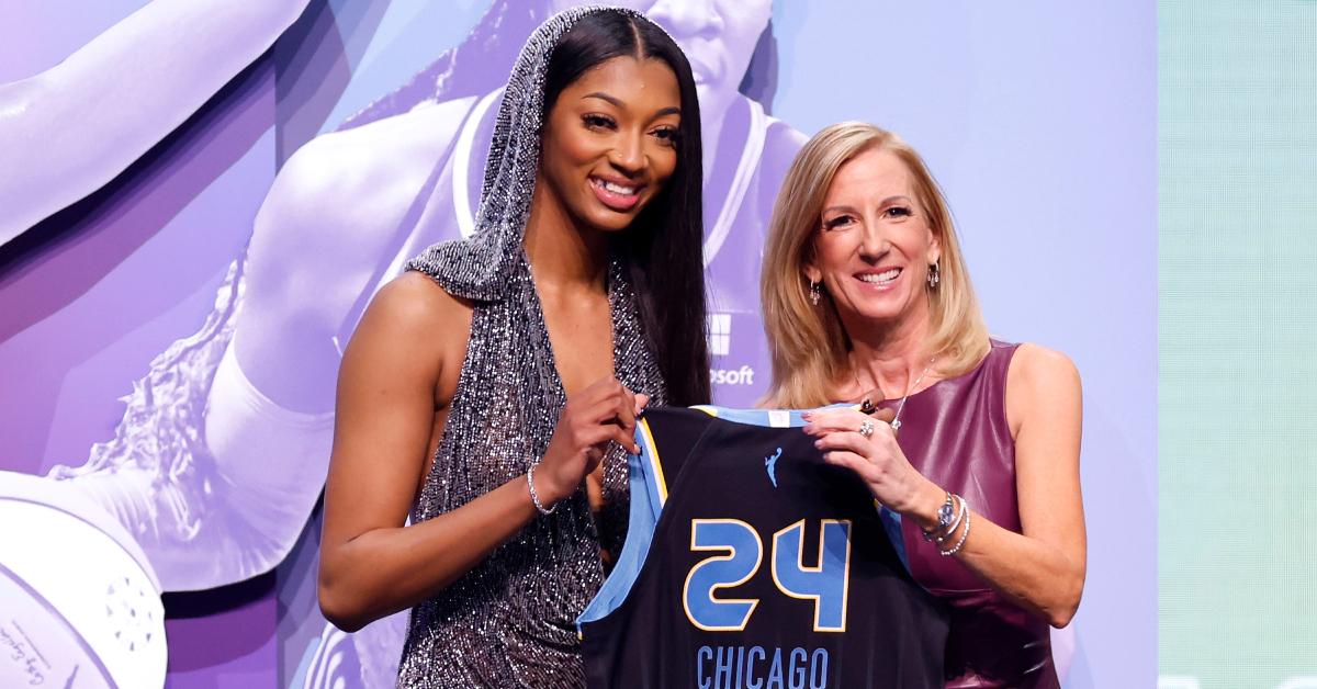 Angel Reese poses with WNBA Commissioner Cathy Engelbert after being selected seventh overall by the Chicago Sky during the 2024 WNBA Draft at Brooklyn Academy of Music on April 15, 2024 in New York City.