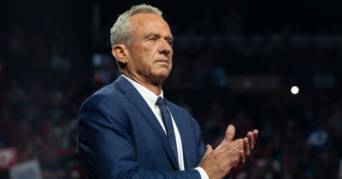 Former Republican presidential candidate Robert F. Kennedy Jr. listens during a campaign rally.