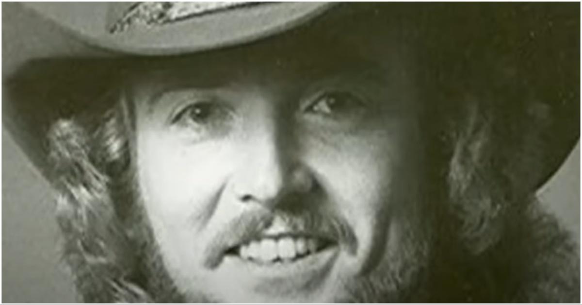 Old black and white photo of Keith Whitley from a documentary on YouTube