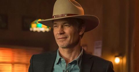 Raylan Givens (Timothy Olyphant) in his signature cowboy hat, black blazer, and blue shirt on 'Justified: City Primeval'