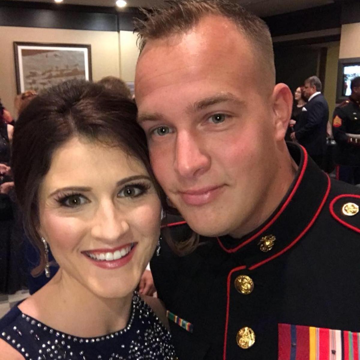 Kay and Randy Epps wearing formal attire at a military event