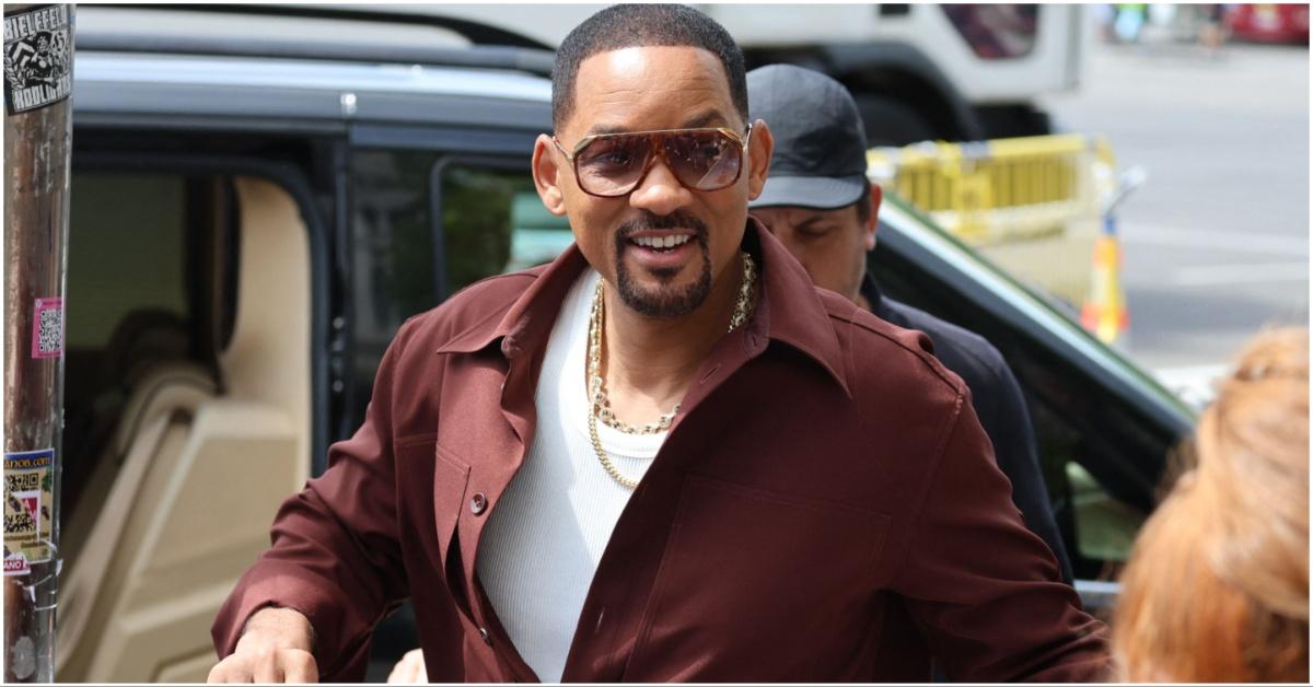 Will Smith getting out of a vehicle