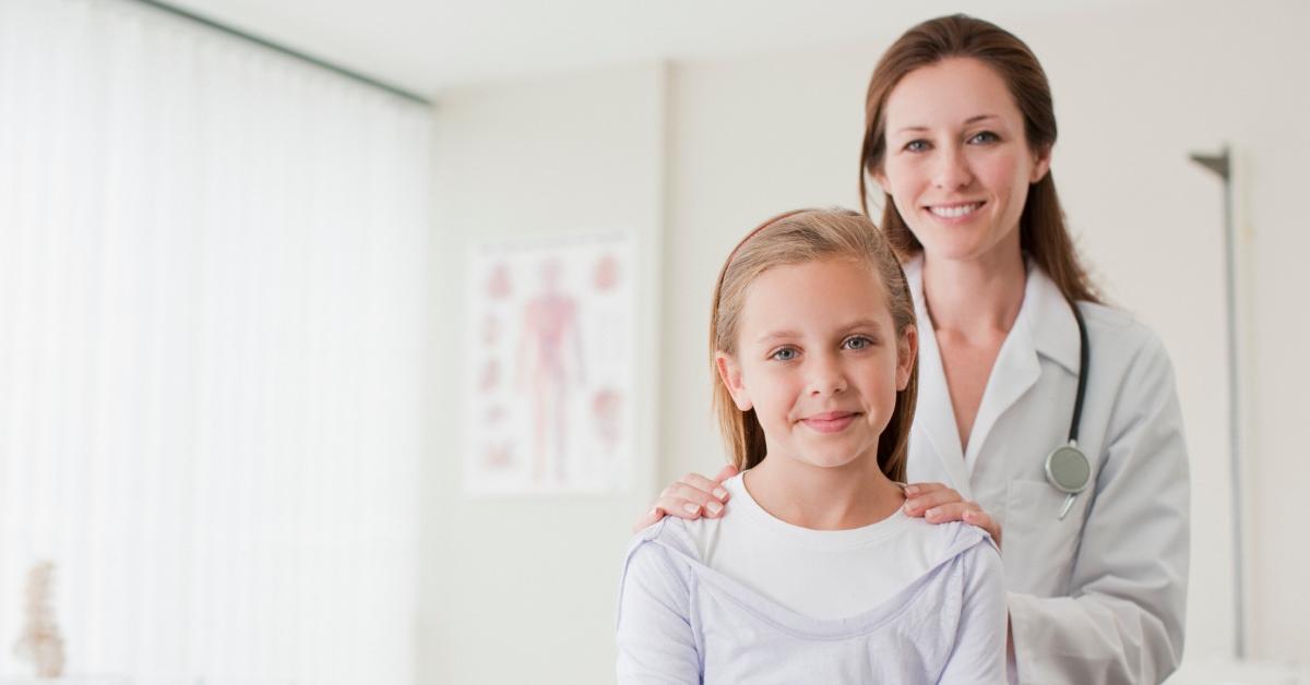 young girl with her pediatrician during an appointment