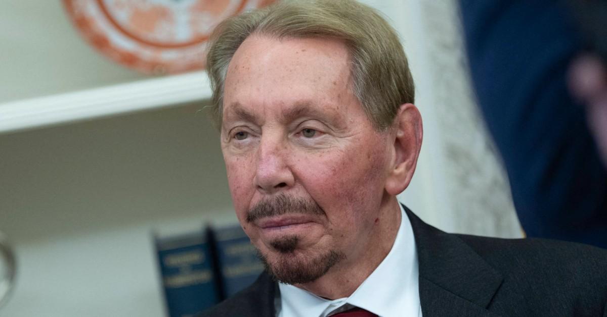 Larry Ellison posing for the camera looking off to the side