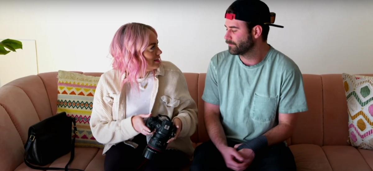 Becca and Austin sit on a couch with her camera after a photoshoot on Married at First Sight