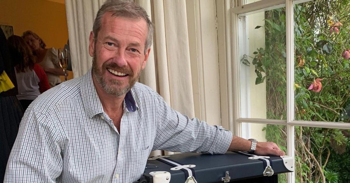 Lord Ivar Mountbatten sits at a window with a chest next to him