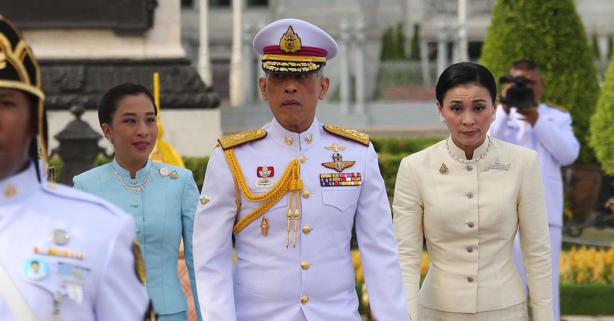 Thailand's King Maha Vajiralongkorn Bodindradebayavarangkun (L) and Queen Suthida (R) and his daughter Princess Bajrakitiyabha