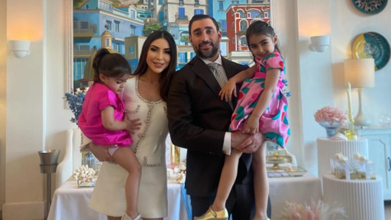 Taleen Marie at an event with her husband and daughters