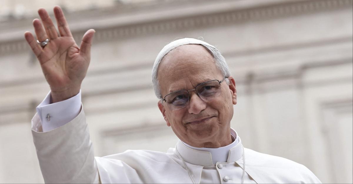 Pope Leo XIV waves to the crowd at The Vatican. 