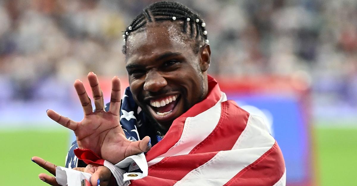 Noah Lyles of Team United States celebrates winning the gold medal during the Men's 100m Fina