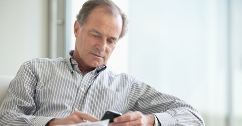 Man looking at phone.