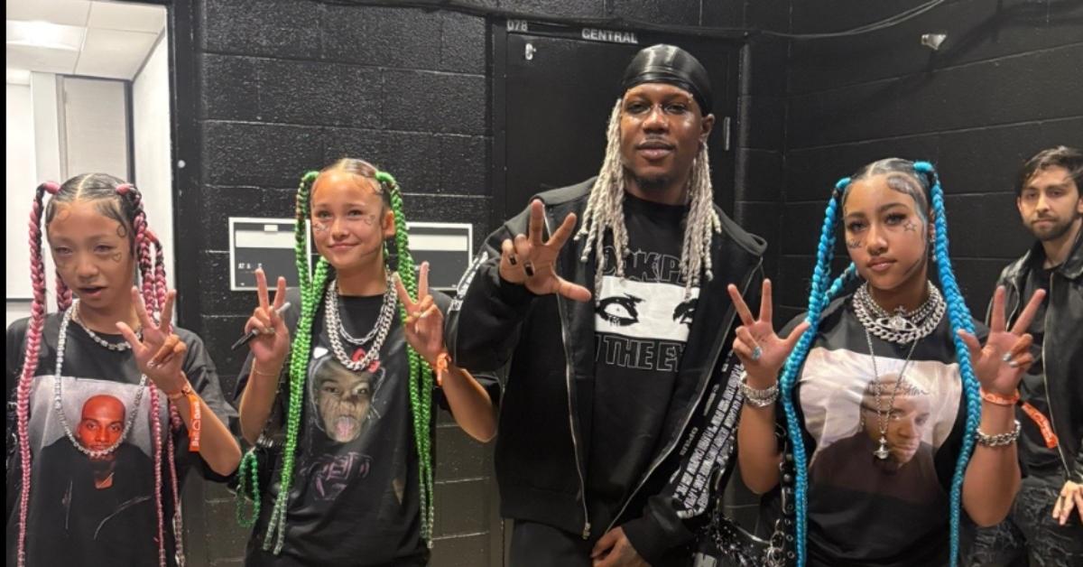 (l-r): North West's friends with an artist and her at a concert.