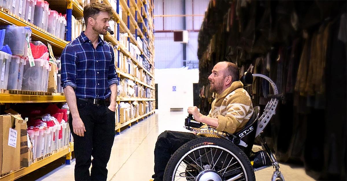 Daniel Radcliffe and David Holmes talking to one another. 