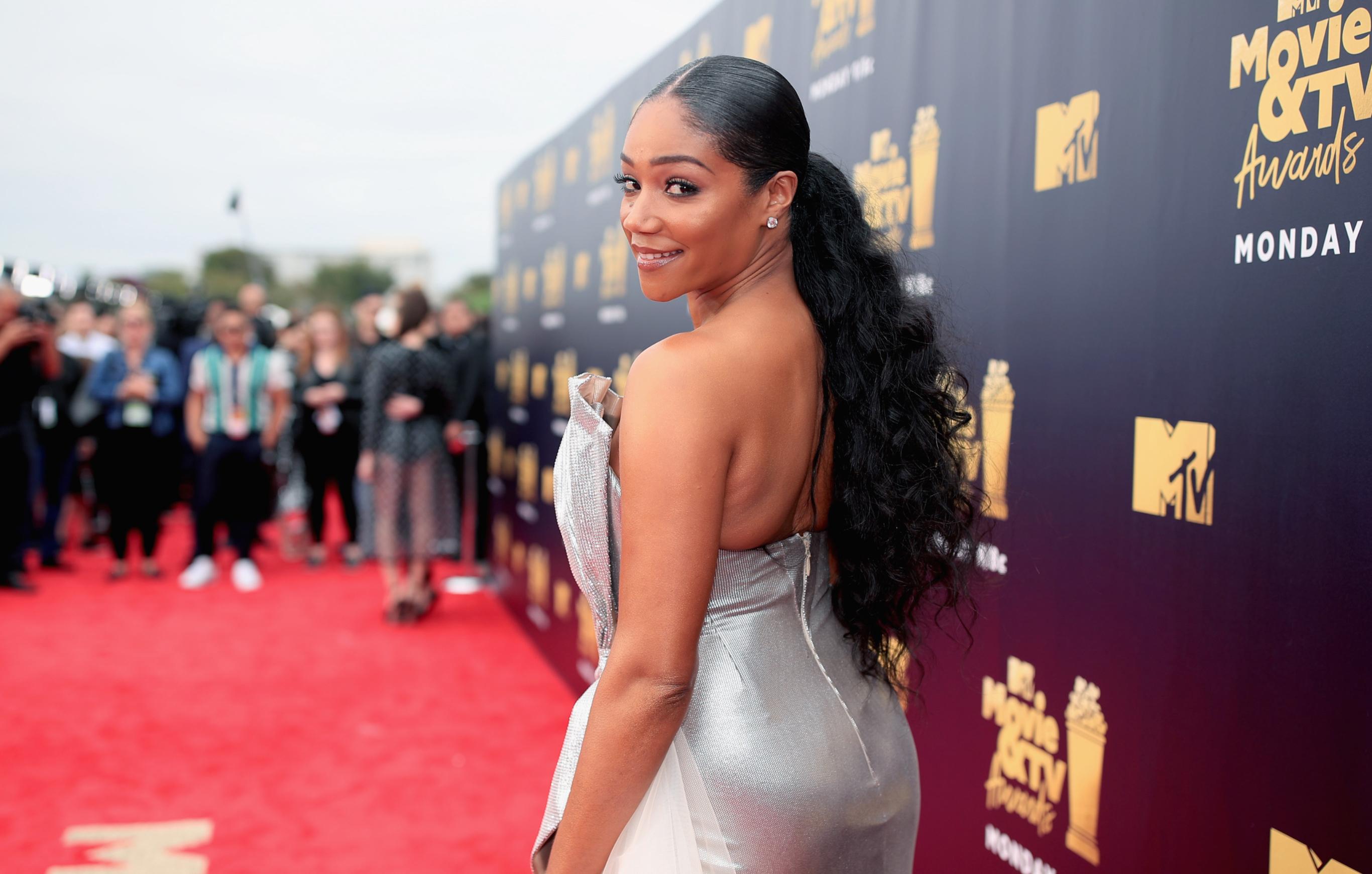 Host Tiffany Haddish attends the 2018 MTV Movie And TV Awards at Barker Hangar on June 16, 2018 in Santa Monica, California.