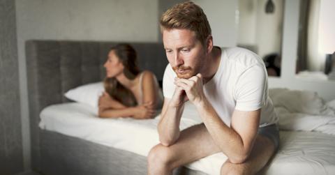 A couple fighting in the bedroom