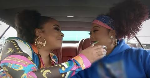 Da Brat and her girlfriend Judy showing affection on the set of their show 'Brat Loves Judy.'