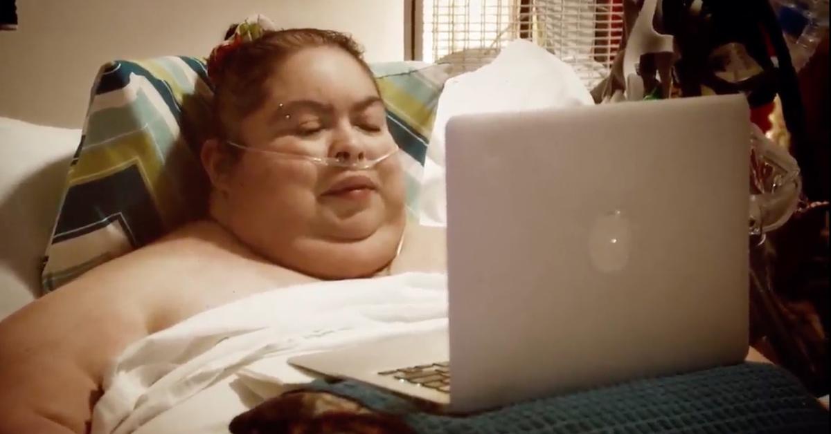 Cindy Vela from 'My 600-lb Life' laying in the bed.