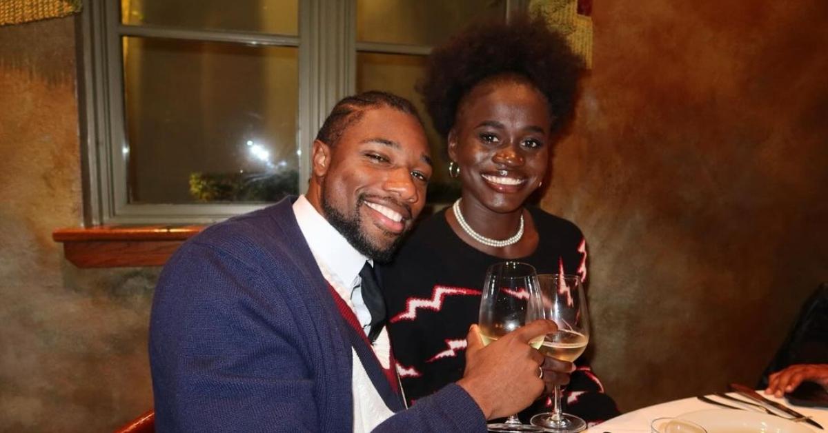 (l-r): Noah Lyles and Junelle Brumfield toasting at dinner