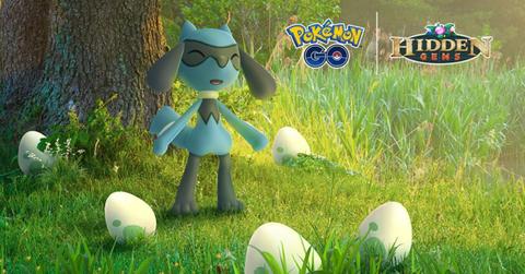 Riolu from Pokémon GO standing around several eggs.