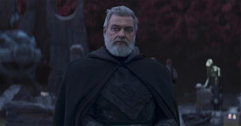 Baylan Skoll standing in a robe.