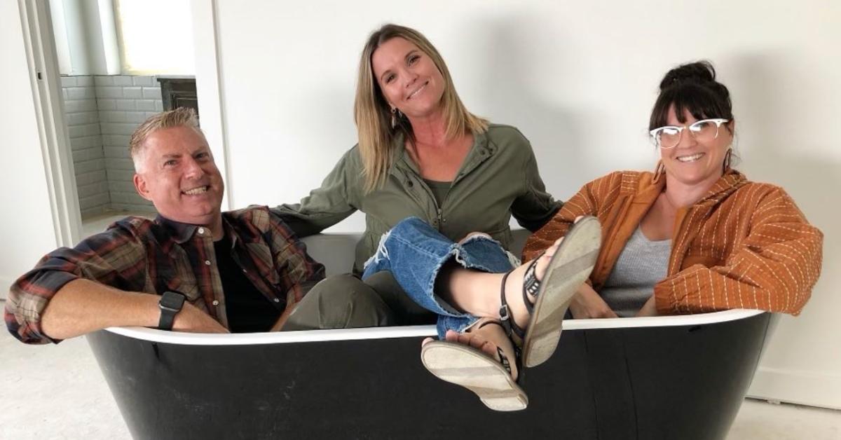 Leslie, Lyndsay, and Jeff in an empty bath from 'Unsellable Houses'