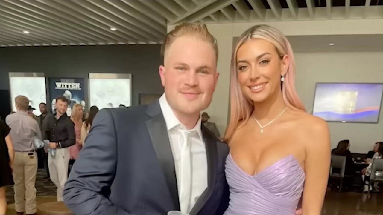 Zach Bryan and Brianna Chickenfry at an event