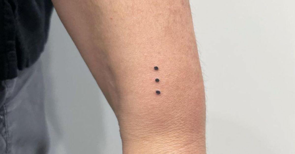 What Does a Party Dot Tattoo Mean? Details on the Ink