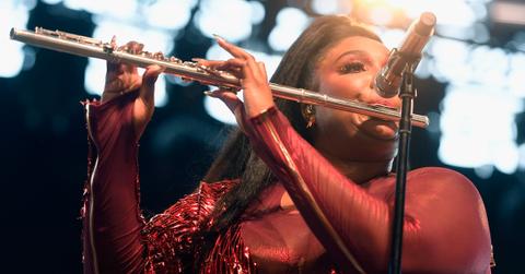 Lizzo playing the flute