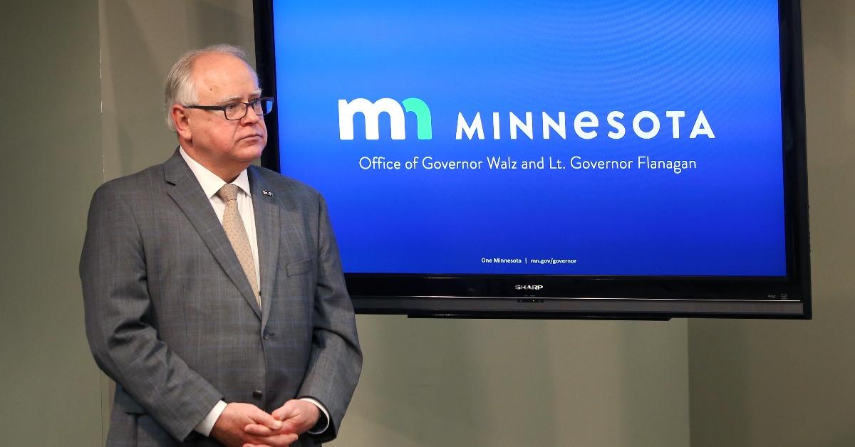 Minnesota Governor Tim Walz waits to speak to the press on June 3, 2020 in St. Paul, Minnesota. A short time earlier the state's Attorney General Keith Ellison announced that charges of aiding and abetting second-degree murder and aiding and abetting second-degree manslaughter had been filed against former Minneapolis police officers Thomas Lane, J. Alexander Kueng, and Tou Thao in the death of George Floyd. Ellison also announced that charges against former officer Derek Chauvin were upgraded to second-degree murder. On May 25, Chauvin kneeled on Floyd's neck for nine minutes while detaining him on suspicion of trying to pass a counterfeit $20 bill. Floyd went unconscious and died at the scene. The other officer were part of the responding team. (Photo by Scott Olson/Getty Images)