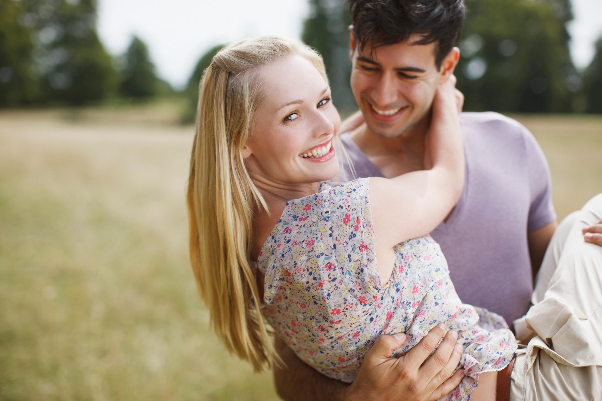 woman man happy in meadow