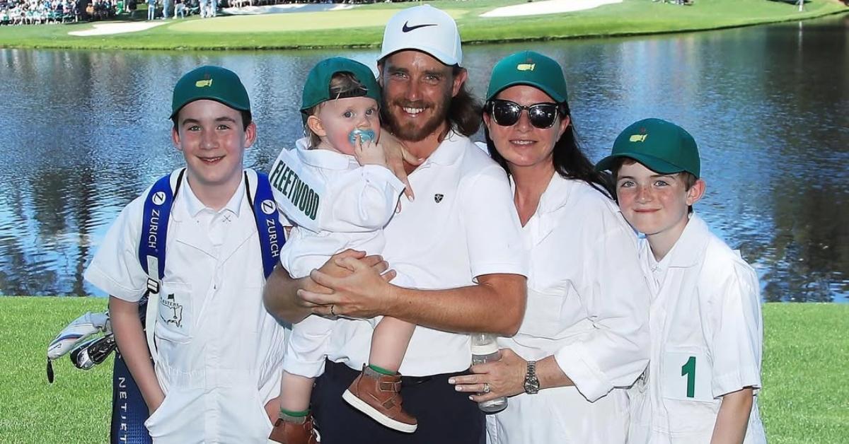 Tommy Fleetwood with his family on a golf course.