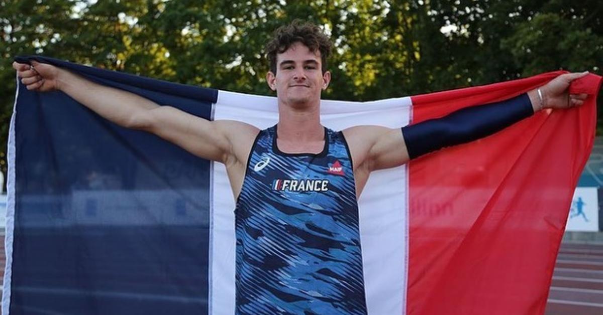 Anthony Ammirati holding a flag