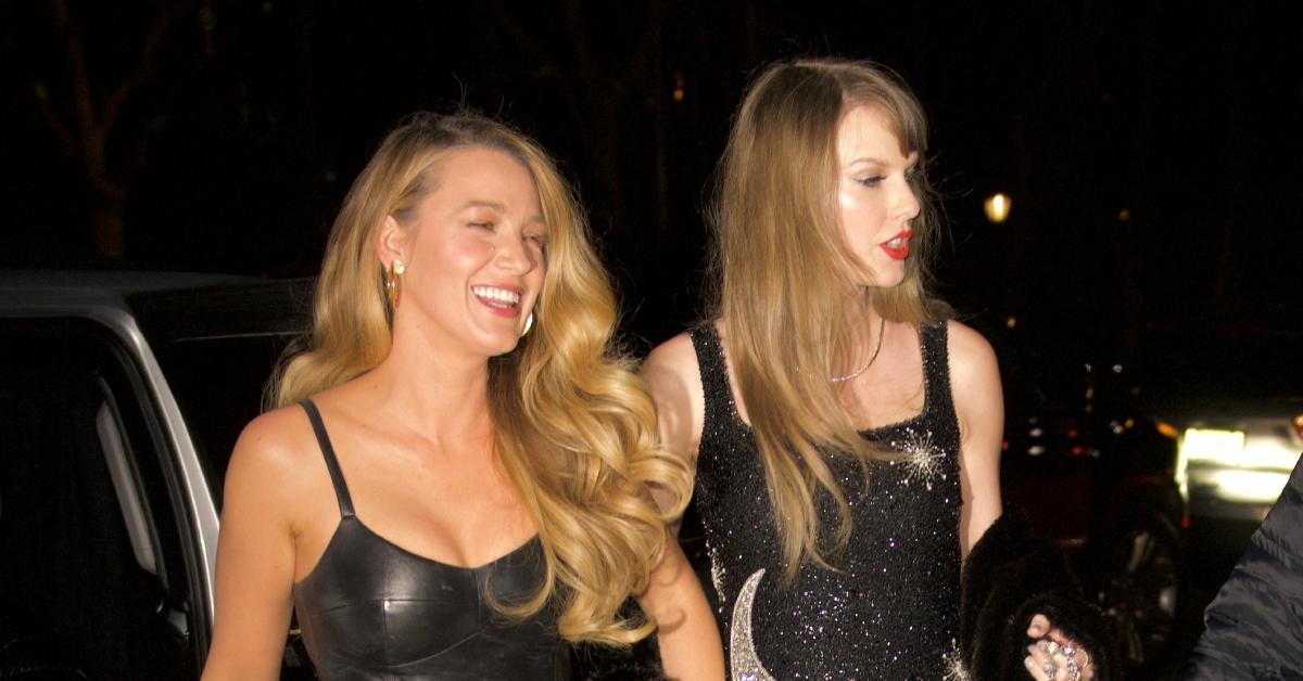 (l-r): Blake Lively and Taylor Swift walking outside