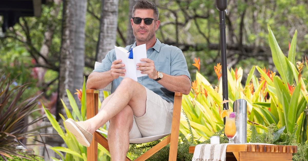 Jesse Palmer sits poolside on Bachelor in Paradise.