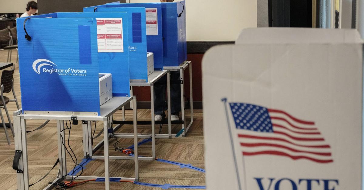 People prepare to vote for election at UC San Diego in November 2024.