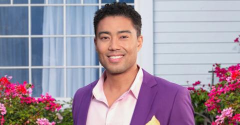Jason Caperna smiles and poses in a purple suit for his official 'The Valley' Season 1 portrait.