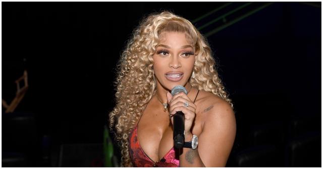 Joseline Hernandez talking into a microphone