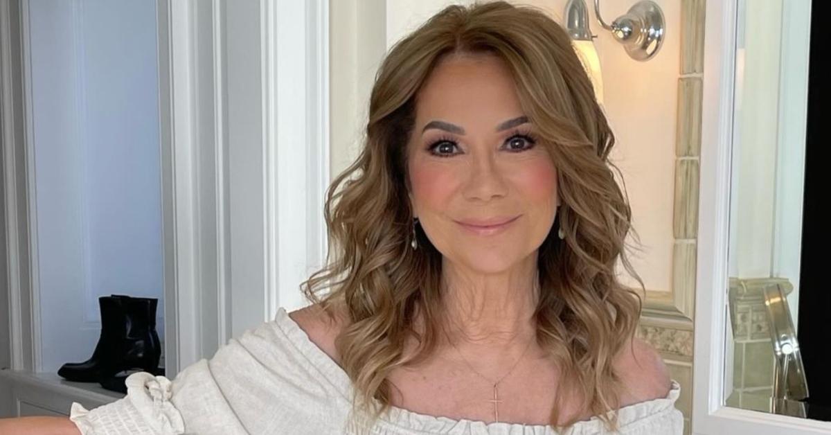 Kathie Lee Gifford wearing white off-the-shoulder dress