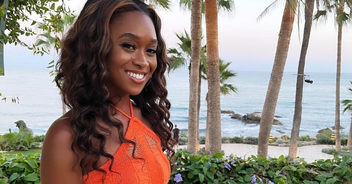 The Bachelor's Kelsey T. on the beach in Spain