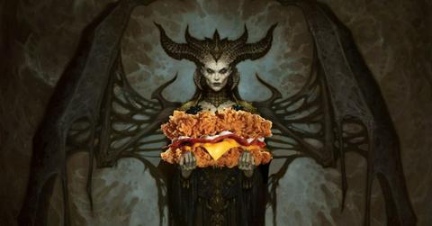 Lilith holding a KFC meal.