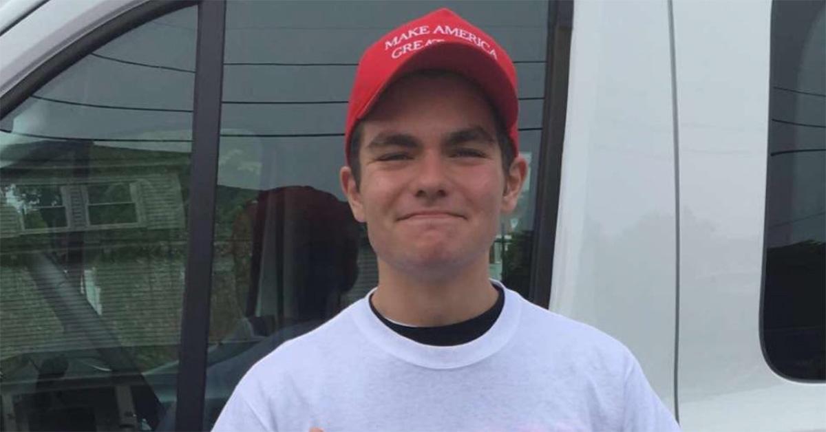 Nick Fuentes in a Make America Great Again hat. 