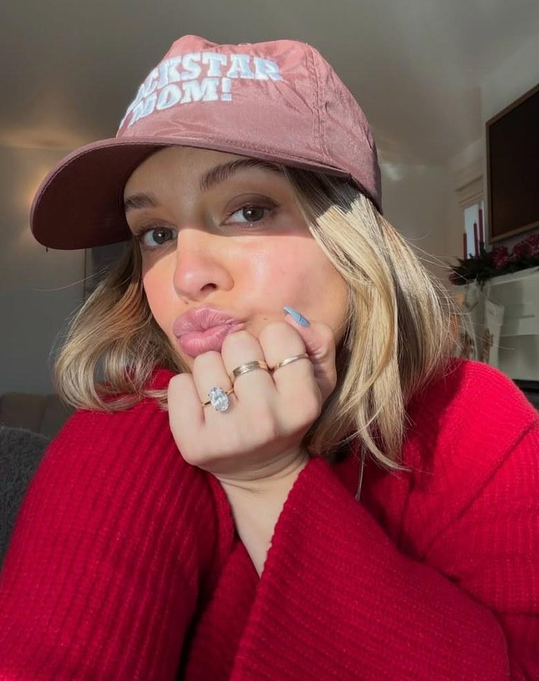 Savannah Jean Alexander wearing a "Rockstar Mom" hat.