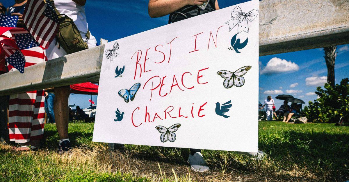 "Rest in Peace Charlie" sign.