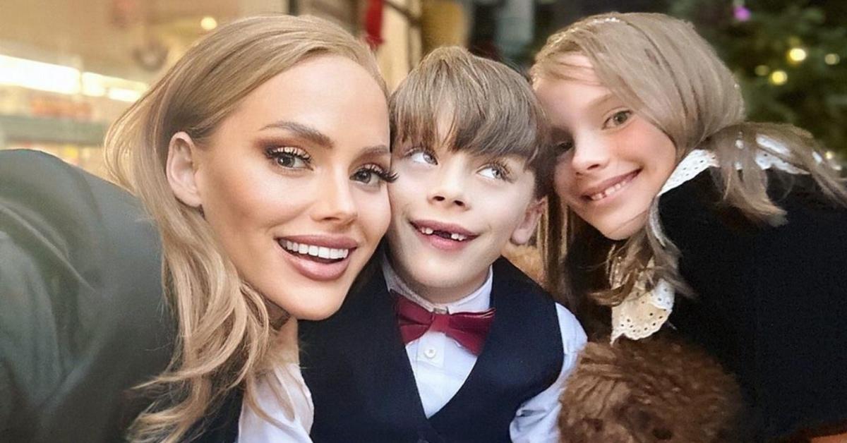 Kathryn Dennis poses with her son and daughter.